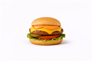 Rundvlees burger (100 gr.) op een zacht bolletje met spicy mayo, sla, tomaat, augurk en gesmolten kaas